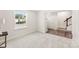 Bright office space with neutral colored walls, carpeted floor, and window at 2016 Tupelo Grove Ln, Gastonia, NC 28054
