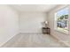 Simple bedroom with neutral colored walls, carpeted floor, and window at 2016 Tupelo Grove Ln, Gastonia, NC 28054