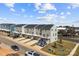 Aerial view of townhome community from street at 2016 Tupelo Grove Ln, Gastonia, NC 28054
