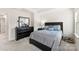 Bright bedroom with a comfortable bed and dresser, offering ample space and natural light at 2016 Tupelo Grove Ln, Gastonia, NC 28054