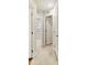 Bright hallway with neutral carpeting connecting to other rooms at 2016 Tupelo Grove Ln, Gastonia, NC 28054