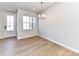 Light and airy dining area near entryway and kitchen at 8932 Connover Hall Ave, Charlotte, NC 28215