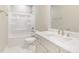 Bathroom with white vanity, quartz countertop and shower at 1412 10Th St, Statesville, NC 28677