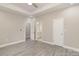 Main bedroom with grey flooring and access to en-suite bathroom at 1412 10Th St, Statesville, NC 28677