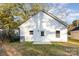 Newly renovated house exterior featuring fresh paint and landscaping at 1412 10Th St, Statesville, NC 28677