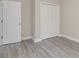 Spacious bedroom with grey flooring and double door closet at 1412 10Th St, Statesville, NC 28677