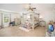 Spacious main bedroom with a canopy bed and ceiling fan at 1628 Savory Ln, Charlotte, NC 28216