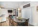 Dining room features a wooden table and access to backyard at 1628 Savory Ln, Charlotte, NC 28216