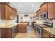 Spacious kitchen with granite countertops and stainless steel appliances at 1628 Savory Ln, Charlotte, NC 28216