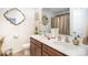 Double vanity bathroom with a large mirror and updated fixtures at 1628 Savory Ln, Charlotte, NC 28216