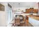Kitchen with dark brown cabinets and granite countertops at 1628 Savory Ln, Charlotte, NC 28216