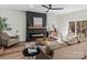 Living room with a modern fireplace and access to backyard at 4180 2Nd Ne St, Hickory, NC 28601