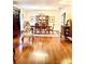 Formal dining room with hardwood floors and elegant furniture at 5486 Kershaw Camden Hwy, Heath Springs, SC 29058