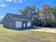 Detached brick two-car garage with extra storage at 5486 Kershaw Camden Hwy, Heath Springs, SC 29058