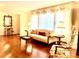 Living room featuring hardwood floors, and a comfortable sofa at 5486 Kershaw Camden Hwy, Heath Springs, SC 29058