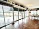 Sunroom with terracotta flooring and backyard access at 5486 Kershaw Camden Hwy, Heath Springs, SC 29058