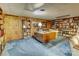 Basement office with a large desk and bookshelves at 139 Cricket Creek Dr # 10-11, Cherryville, NC 28021