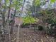 Brick house side view surrounded by mature trees at 139 Cricket Creek Dr # 10-11, Cherryville, NC 28021