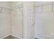 Walk-in closet with wire shelving and hanging rods at 1909 Galloway Rd # Lot 46, Charlotte, NC 28262