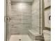 Large walk-in shower with tiled walls and built-in seat at 1909 Galloway Rd # Lot 46, Charlotte, NC 28262