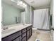 Clean bathroom with double vanity and shower/tub combo at 2741 Smethwick Ln, Gastonia, NC 28056