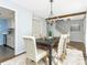 Open concept dining room with kitchen views at 8002 Regent Park Ln, Charlotte, NC 28210