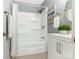 Clean bathroom with a tub shower combo and white cabinetry at 8002 Regent Park Ln, Charlotte, NC 28210