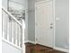 Bright entryway with staircase and hardwood floors at 8002 Regent Park Ln, Charlotte, NC 28210