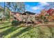 Elevated deck and pergola overlooking a large backyard at 841 12Th Nw Ave, Hickory, NC 28601