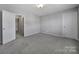 Spacious bedroom with plush carpeting and neutral walls at 1243 Scotch Meadows Loop, Monroe, NC 28110