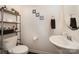 Clean and modern half bathroom, with stylish shelving at 12614 Chantrey Way, Huntersville, NC 28078