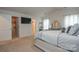 Main bedroom showcasing a large bed, ensuite bathroom, and walk-in closet at 318 Kingsford Dr, Stanley, NC 28164