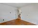 Small bedroom with hardwood floors and doorway at 4501 Taylorsville Hwy, Statesville, NC 28625
