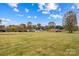 Open lot with neighboring homes and rural landscape at 4501 Taylorsville Hwy, Statesville, NC 28625