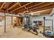 Finished basement area with home gym setup and fireplace at 4501 Taylorsville Hwy, Statesville, NC 28625