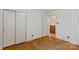 Bright bedroom with wood floors and a double door closet at 4501 Taylorsville Hwy, Statesville, NC 28625