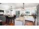 Kitchen with island and stainless steel appliances at 9702 Eagle Feathers Dr, Charlotte, NC 28214