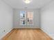 Bright bedroom with hardwood floors and large windows offering natural light at 3000 South Blvd # 305, Charlotte, NC 28209