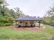 Charming white ranch house with a covered porch at 41 Calhoun St, Great Falls, SC 29055