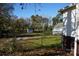 Large backyard with chain link fence and storage shed at 7318 Old Mt Holly Rd, Charlotte, NC 28214