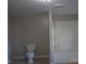 Clean bathroom with a shower/tub combo and toilet at 7318 Old Mt Holly Rd, Charlotte, NC 28214