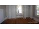 Spacious bedroom with hardwood floors and ample closet space at 7318 Old Mt Holly Rd, Charlotte, NC 28214