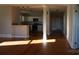 Updated kitchen with white cabinets, granite countertops, and stainless steel appliances at 7318 Old Mt Holly Rd, Charlotte, NC 28214