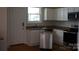 Efficient kitchen with white cabinets and a dishwasher at 7318 Old Mt Holly Rd, Charlotte, NC 28214