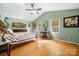 Bright main bedroom with vaulted ceilings, hardwood floors, and ample natural light at 1155 Counselor Dr, Newton, NC 28658