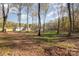 View of house from the wooded backyard at 2215 Charlotte Hwy, York, SC 29745