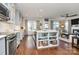 Open concept kitchen with island and living area view at 2903 Thayer Dr, Waxhaw, NC 28173