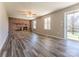 Living room with fireplace, wood floors and sliding glass doors at 504 Crawley Gin Rd, Shelby, NC 28150