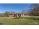 Brick ranch house with a front yard at 504 Crawley Gin Rd, Shelby, NC 28150