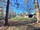 Backyard view of house and detached shed at 722 Tanglewood Dr, Salisbury, NC 28144